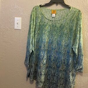 Beautiful light green with blued silver studs around the top light weight